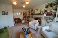 a living room with a christmas tree